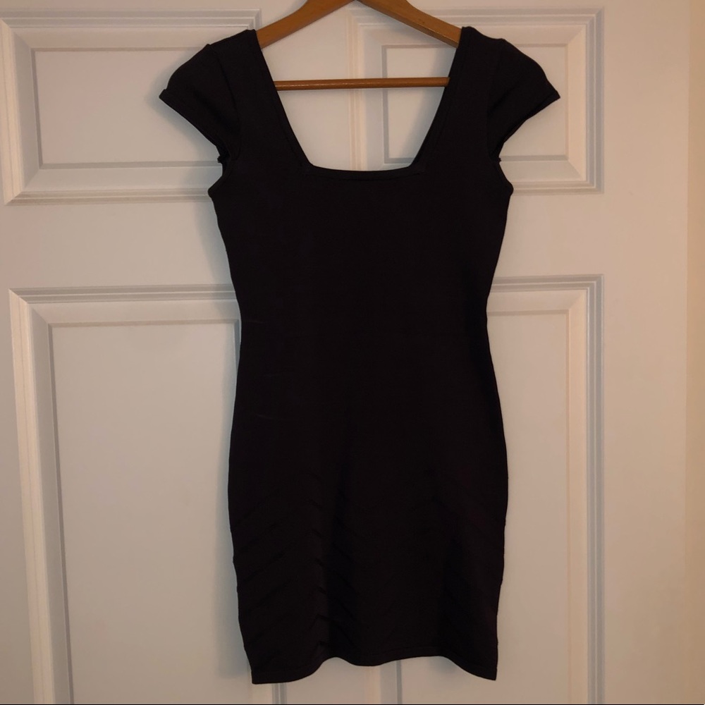 Purple bebe mini dress with chevron stitching.